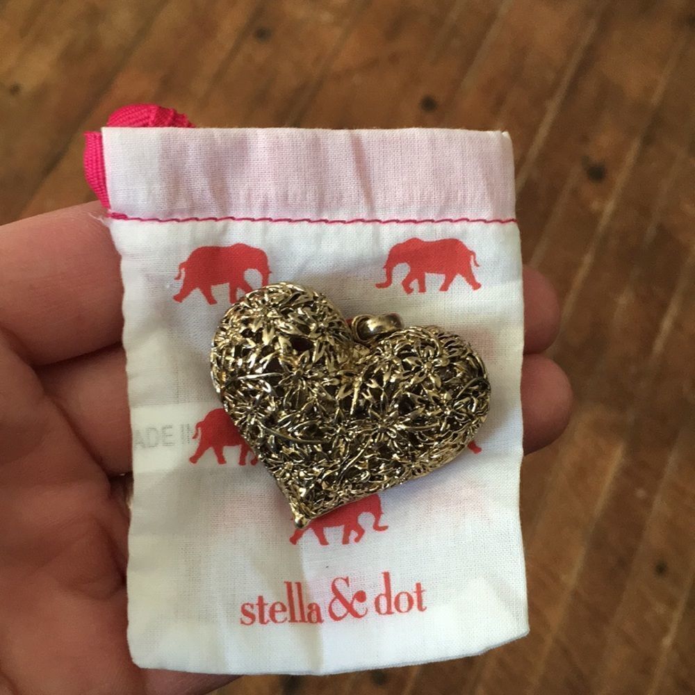 Stella & Dot large, flower detail hollow brass heart
